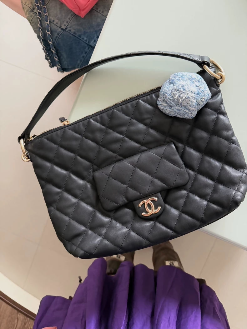 Chanel 23B hobo bag, black and gold, small size