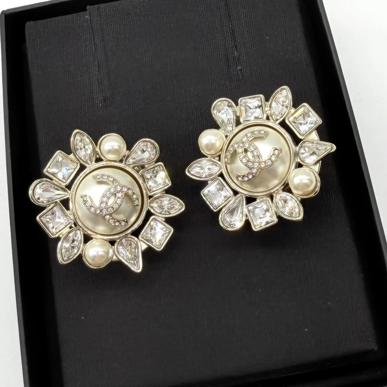 Chanel snow-white pearl flower clip-on earrings
