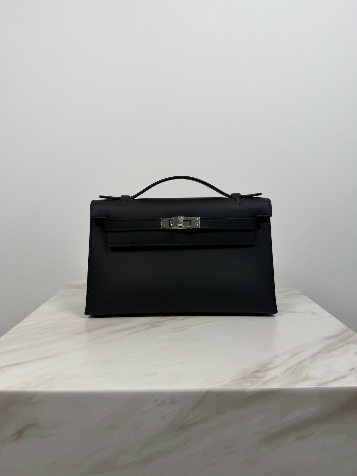 Hermès Kelly Pochette Black Swift Palladium hardware