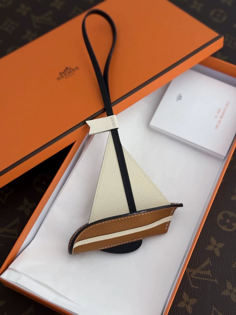 Hermès Epsom Sail 24 Bag Charm Nata/Gold/Black Veau leather