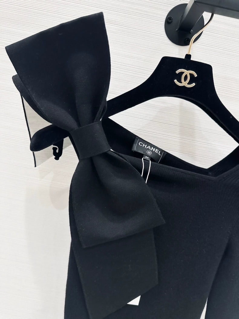 Chanel 25K black off-the-shoulder Bow top