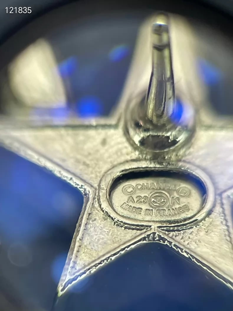 Chanel double C rhinestone star earrings