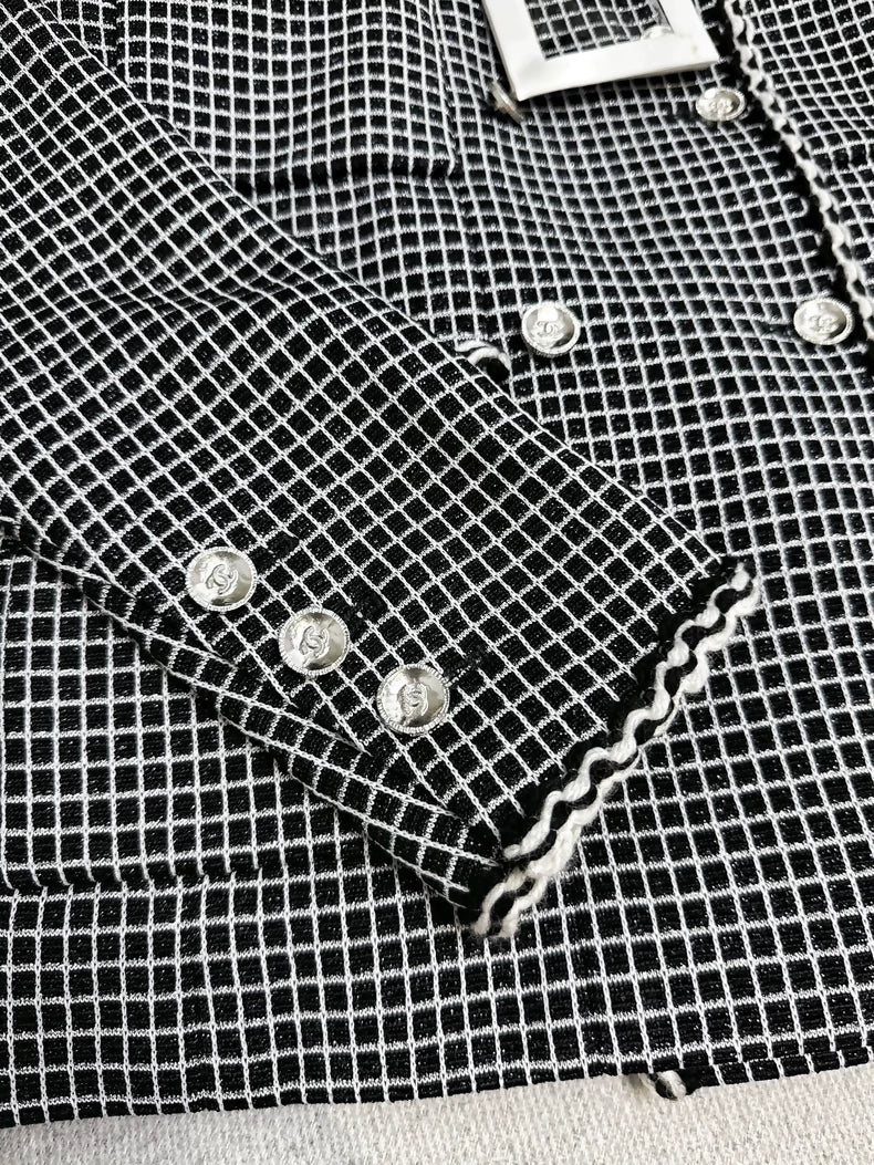 Chanel 25c black and white checkered jacket