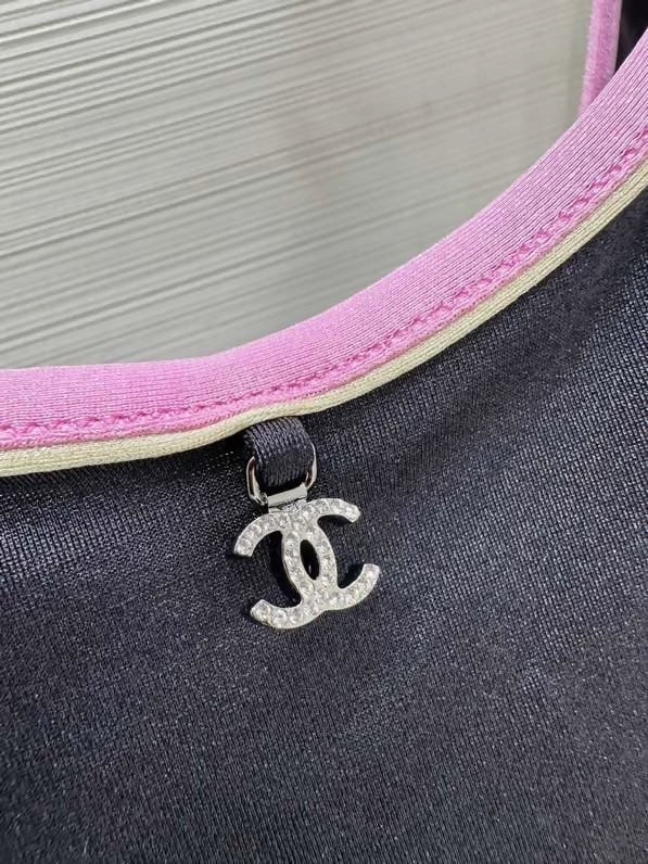 Chanel 25m Coco Beach collection pink-trimmed swimsuit
