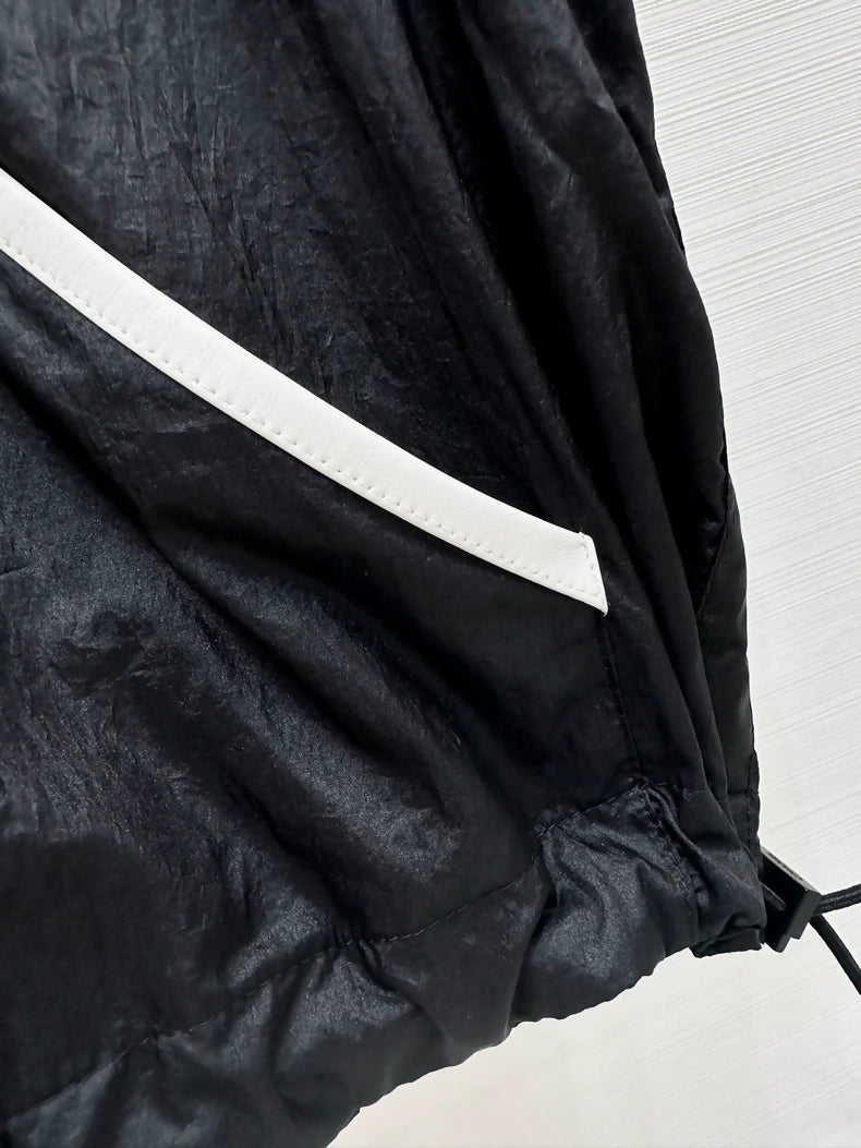 Chanel 26M Coco Beach black hooded vest, F36.