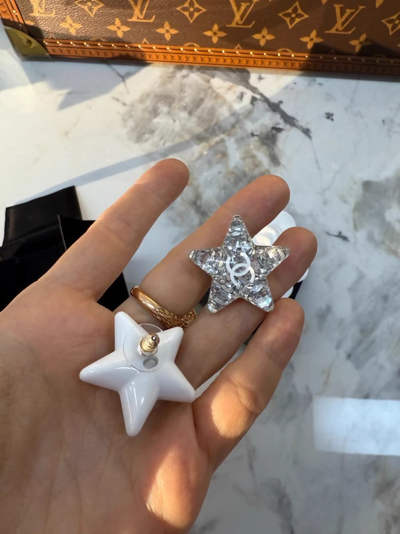 Chanel 25c double C acrylic star silver earrings