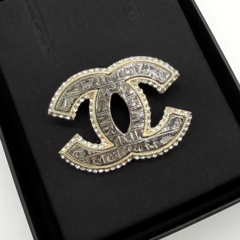 Chanel Egyptian relief double C brooch