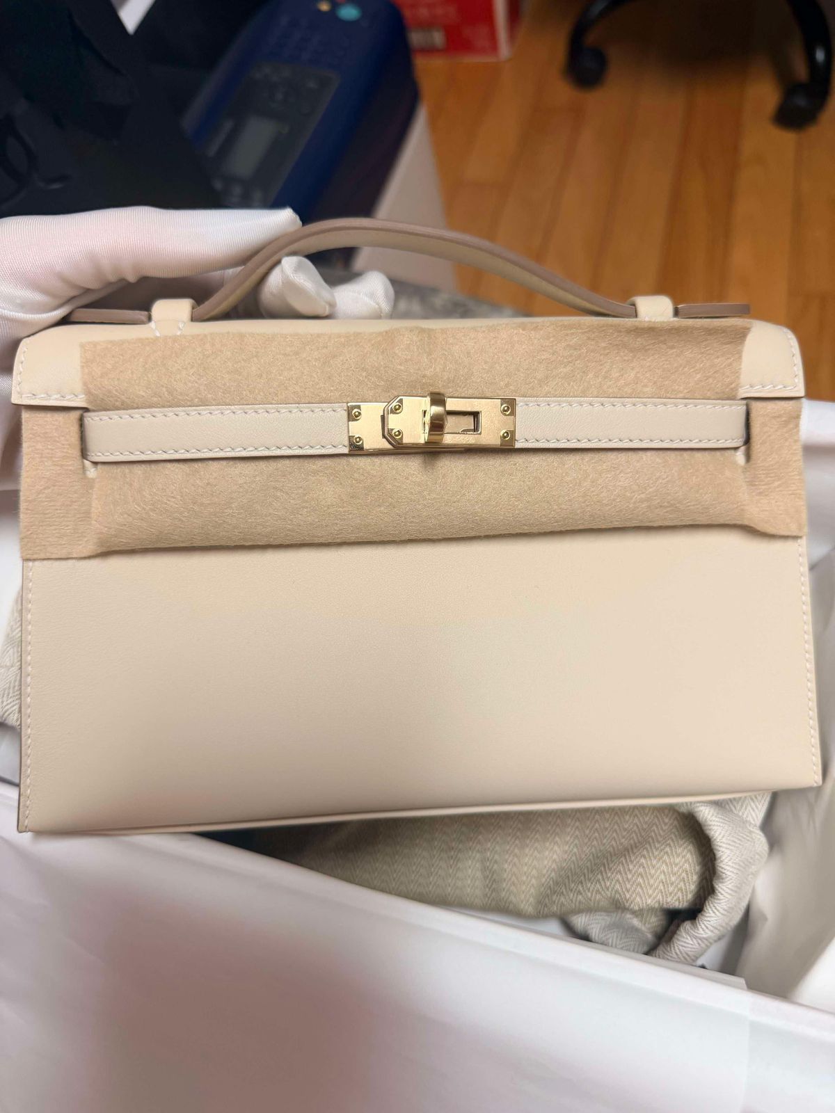 Hermes Kelly pochette Craie Swift Permabrass hardware