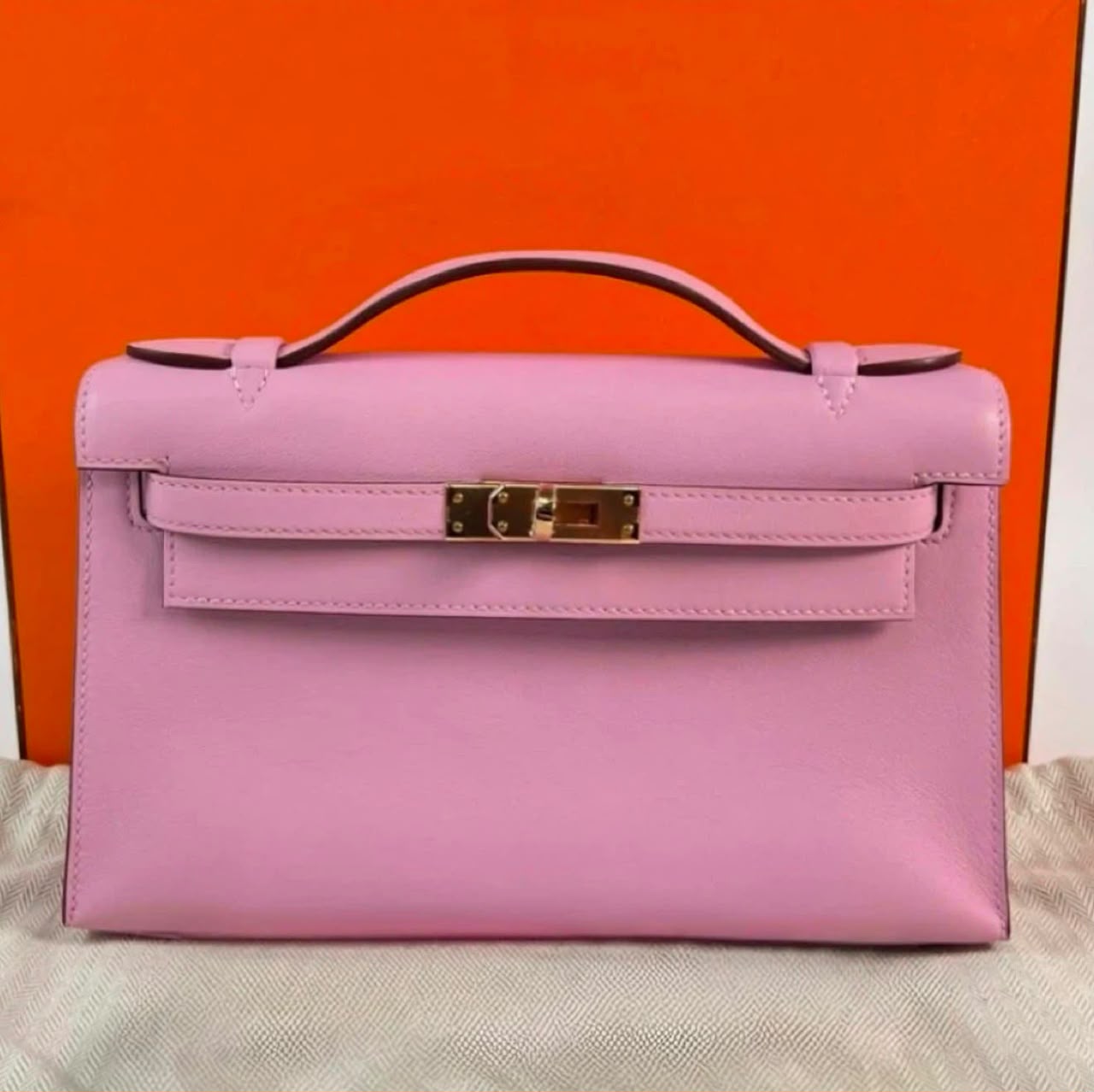 Hermes Kelly pochette Mauve Sylvestre Swift Rose gold hardware