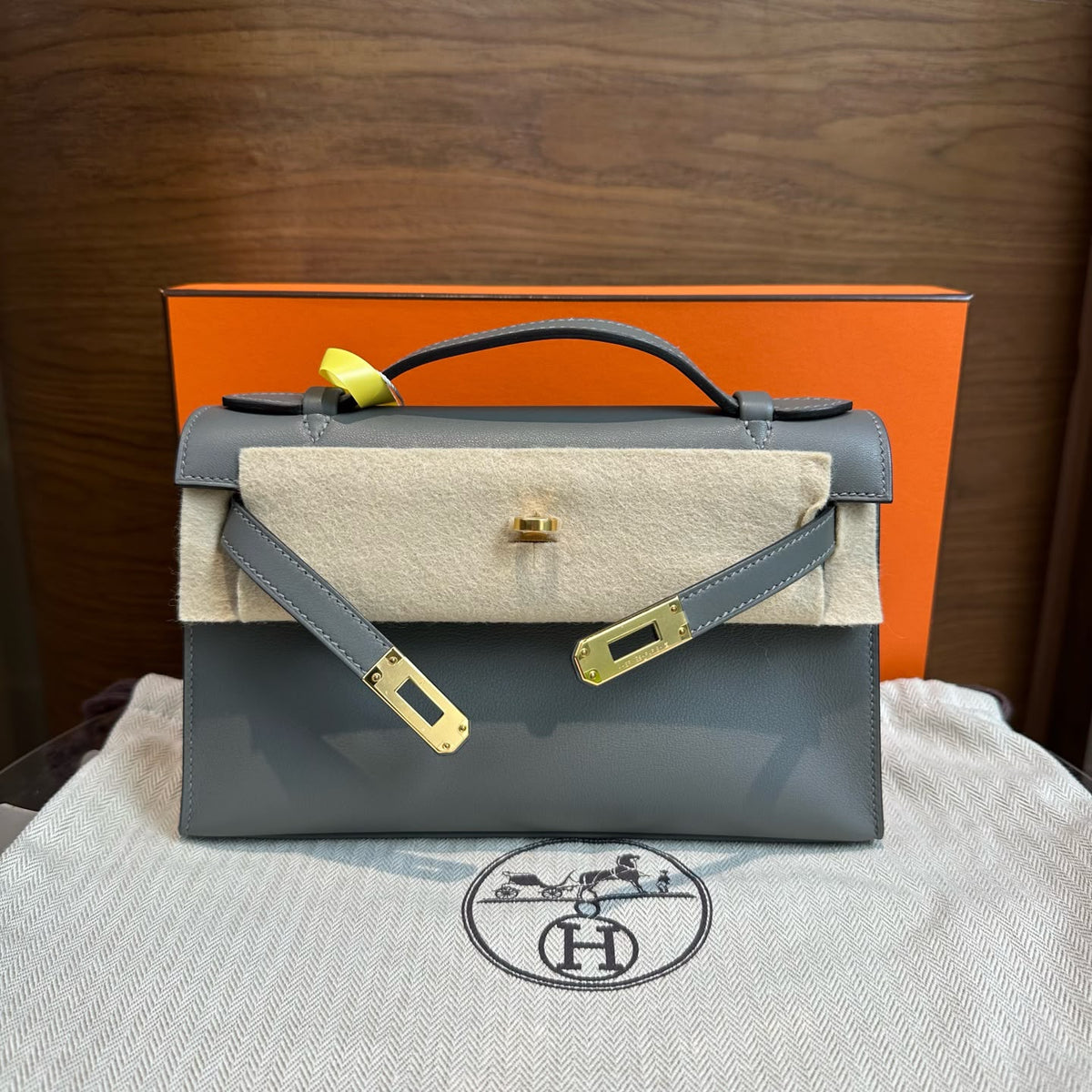 Hermes Kelly pochette Gris Meyer Swift Gold hardware