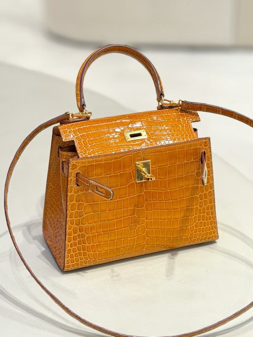 Hermes Mini Kelly 20 Pain d’Epice Shiny Porosus Gold hardware
