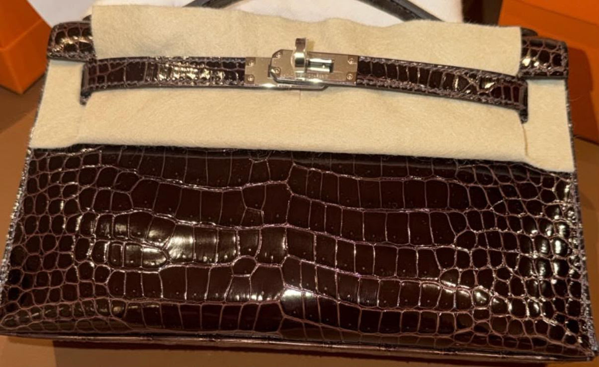 Hermes Kelly pochette Havane Shiny Porosus Palladium hardware