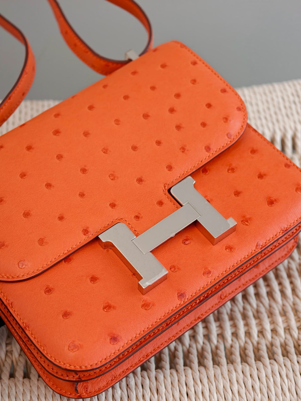 Hermes constance 18 tangerine ostrich palladium hardware