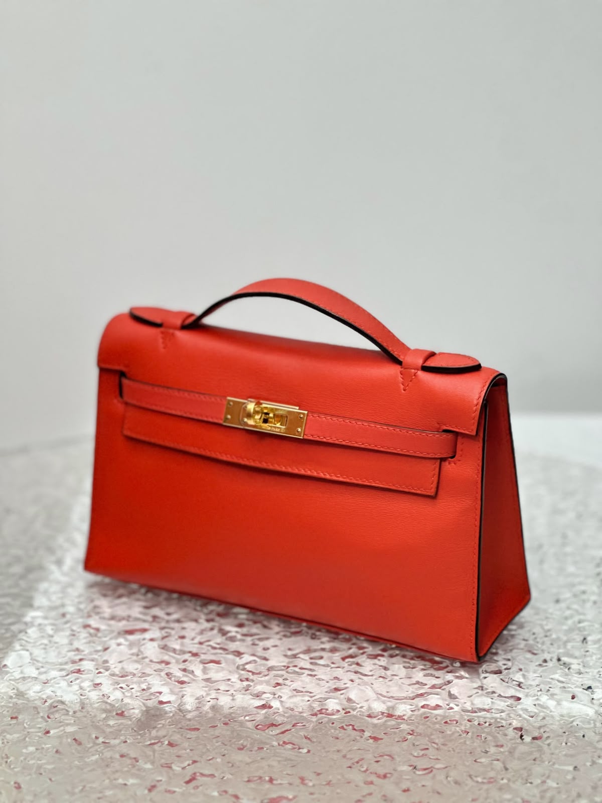 Hermes Kelly pochette Rouge Tomate Swift Gold hardware