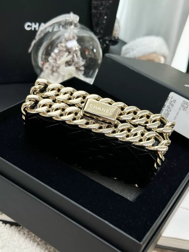 Chanel 22C black and gold acrylic bag