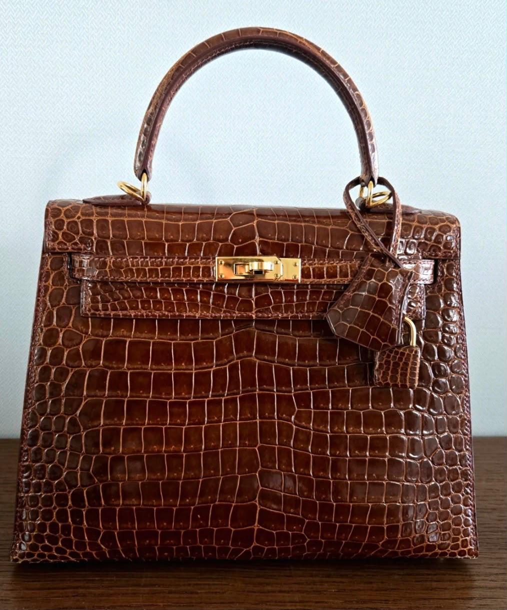 Hermes Kelly 25 Miel Shiny Porosus gold hardware