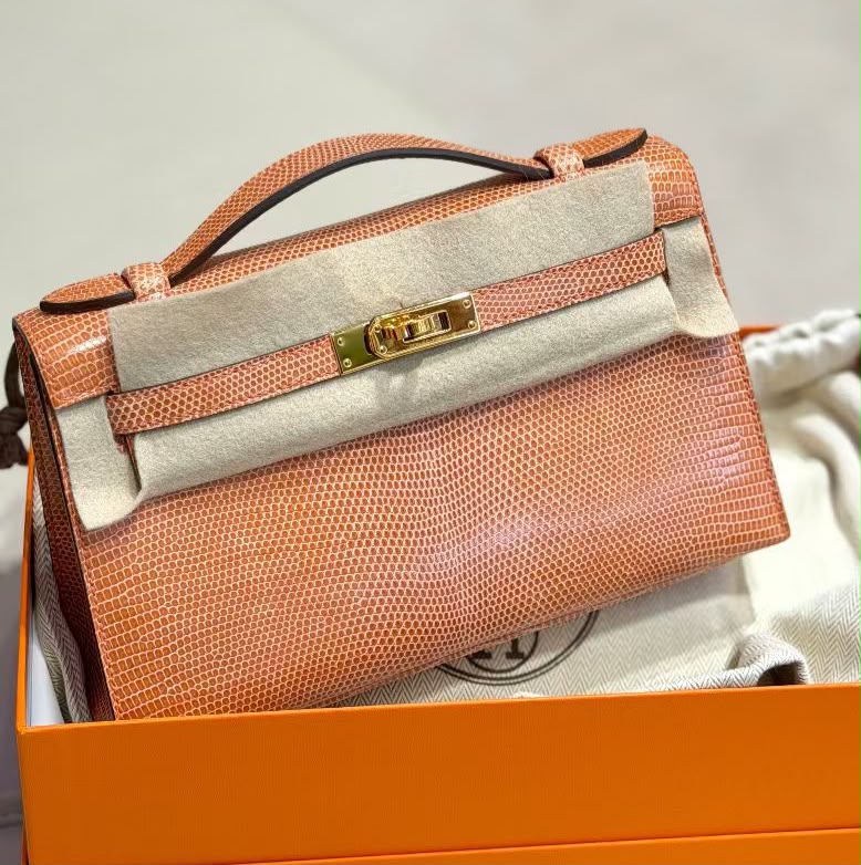 Hermes Kelly pochette rosy lizard gold hardware