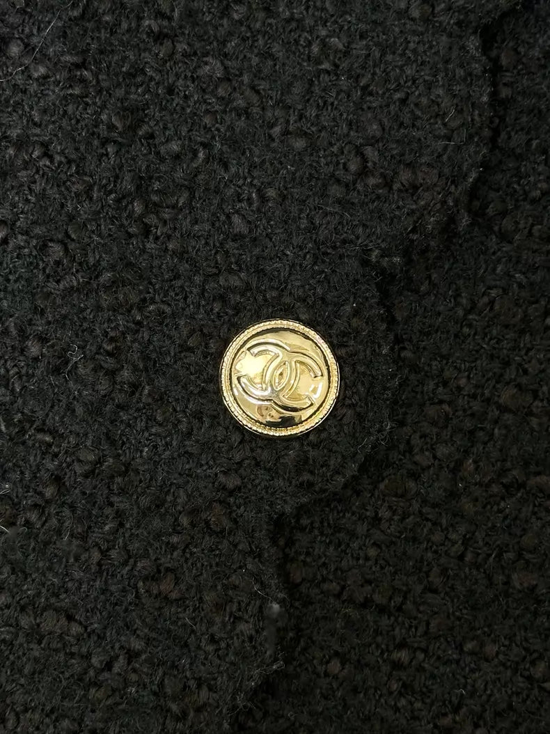 Chanel 20k black tweed jacket