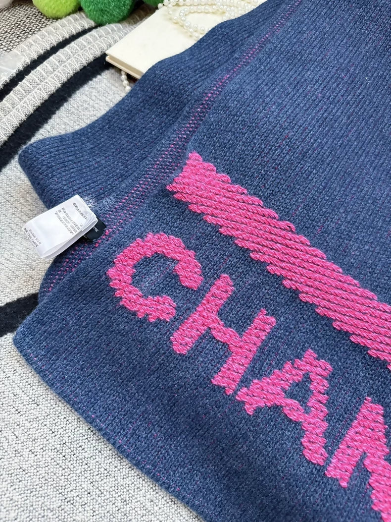 Chanel 22 pink cashmere scarf with Chanel logo and denim blue