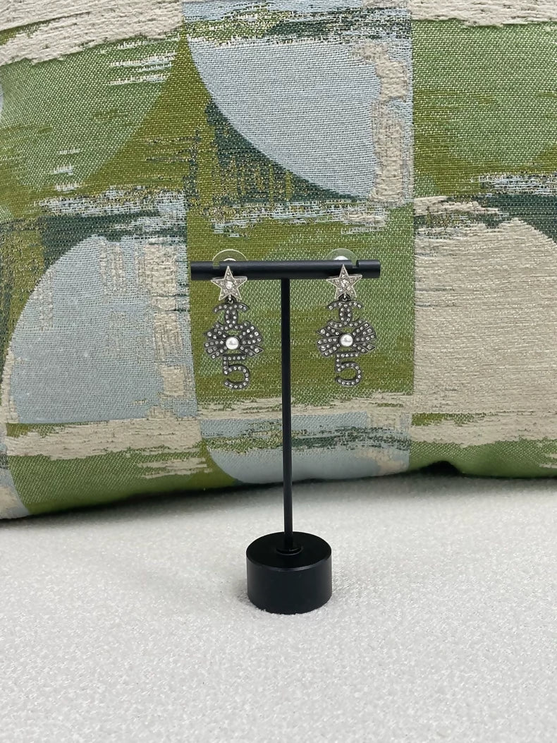 Chanel multi-element star and bow earrings