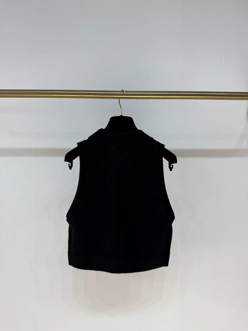 Chanel 22A black knitted vest with charms
