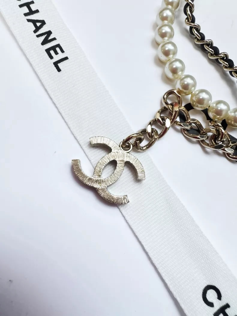 Chanel 21K pearl and rhinestone double-layered leather chain choker necklace