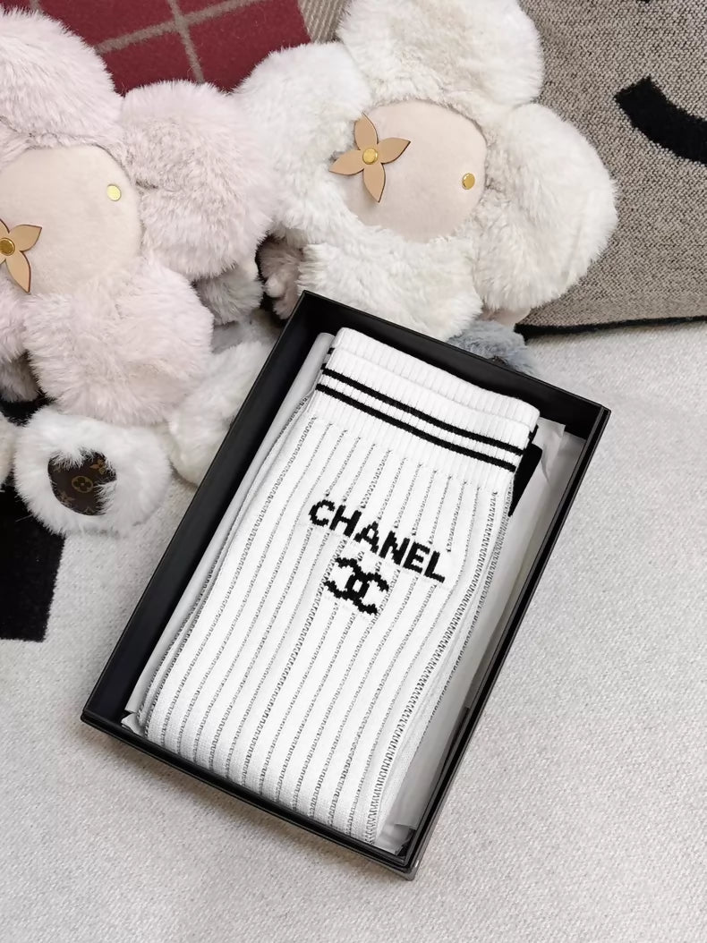 Chanel 24C white and black striped stockings