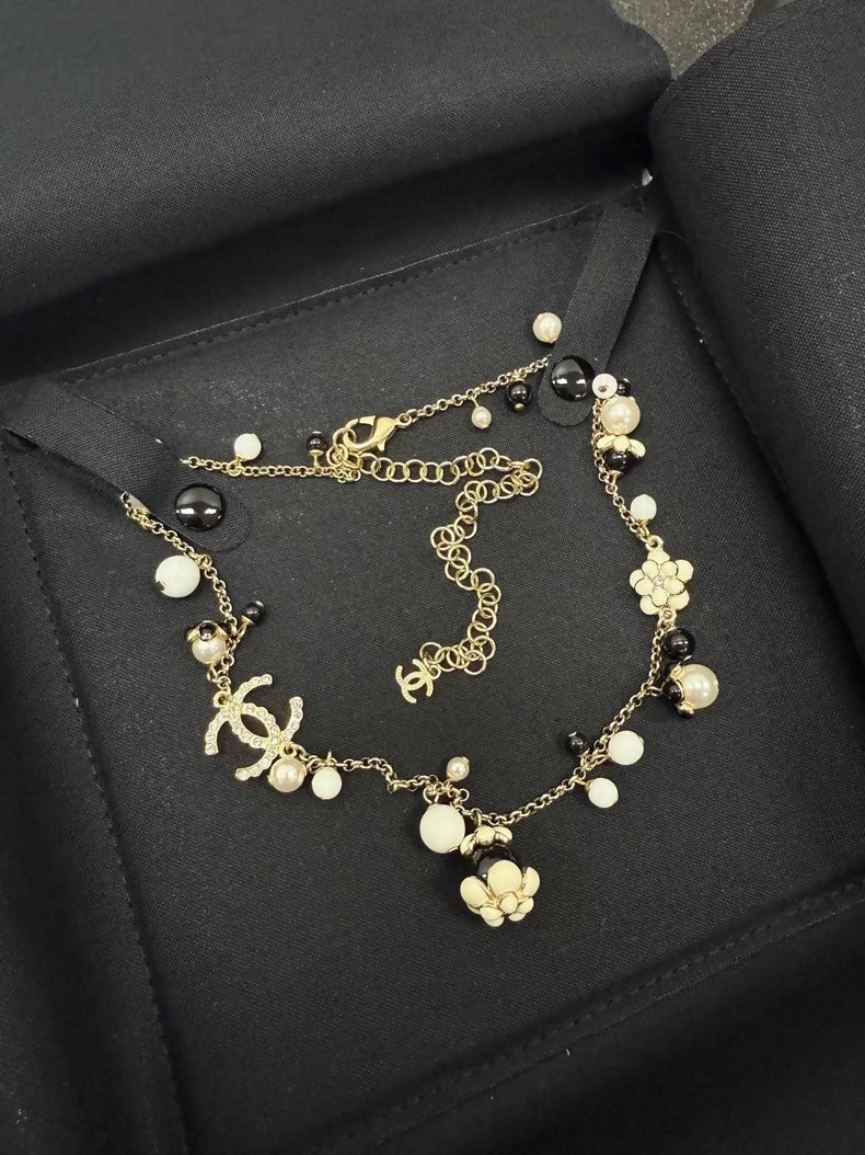 Chanel exquisite black and white enamel floral choker necklace