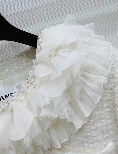 Chanel 25k white tweed jacket