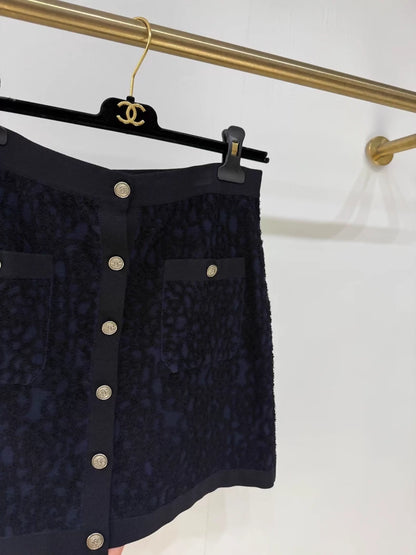 Chanel 21C camellia midi skirt,