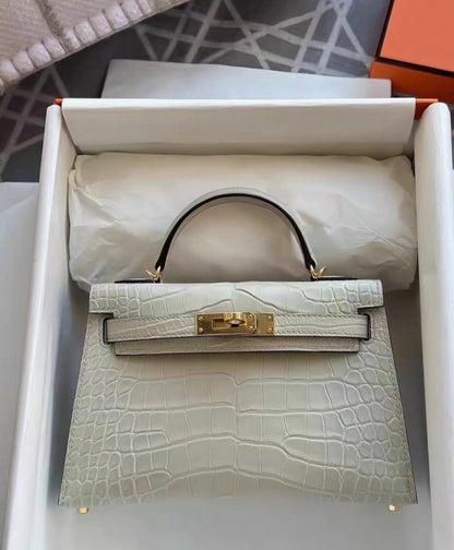 Hermès Mini Kelly Cream White matte crocodile leather gold hardware