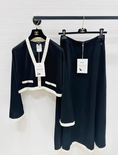 Chanel 25A black & white cardigan