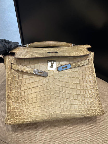 Hermès Kelly 32 Himalaya Gris Cendre Crocodile leather Palladium Hardware