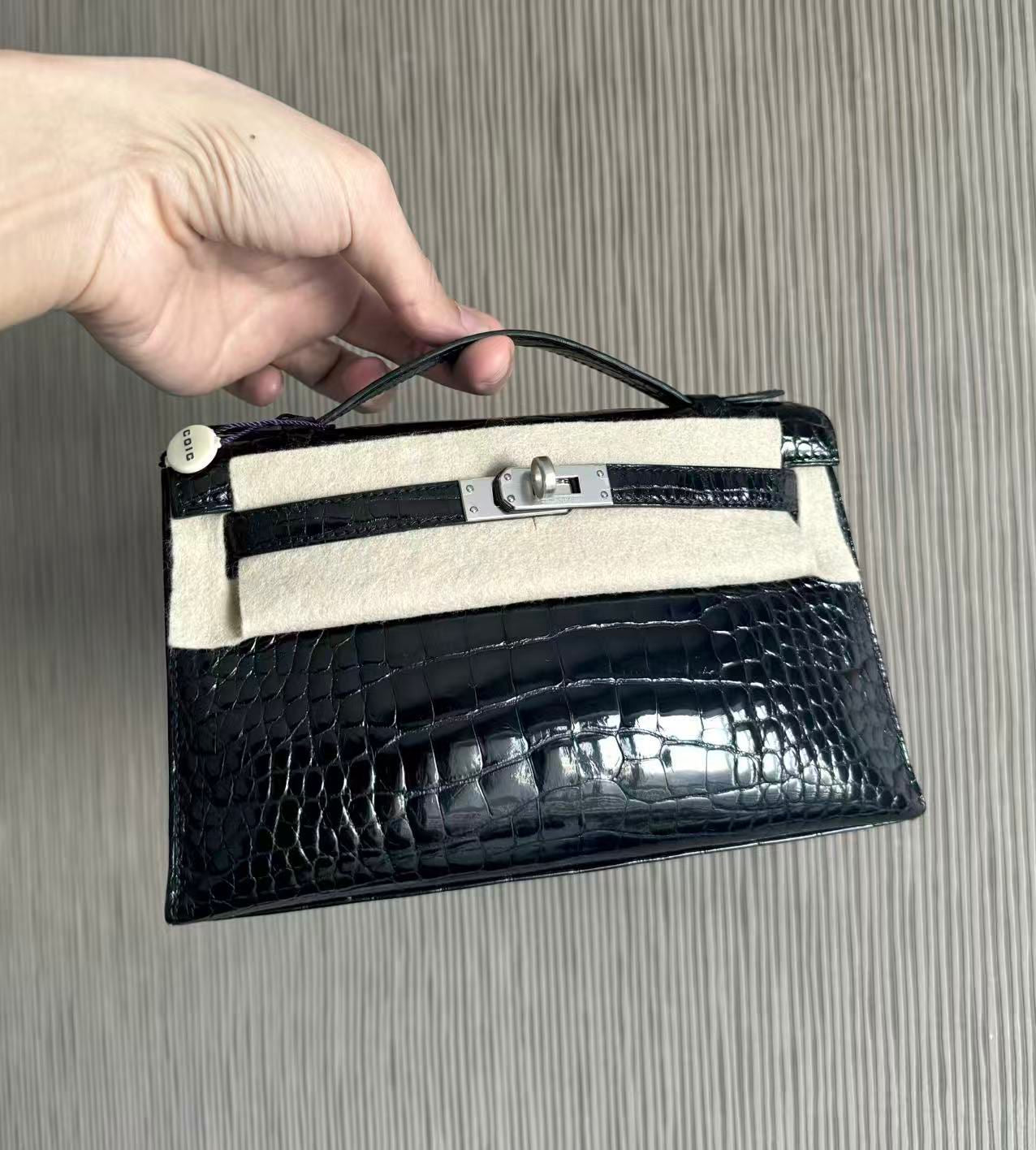 Hermès kelly Pochette Black Shiny crocodile leather palladium hardware