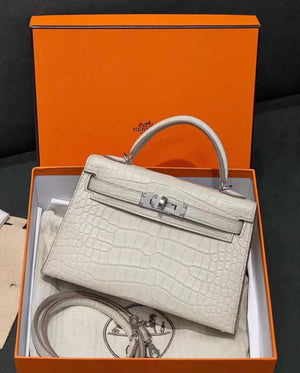 Hermès Mini Kelly Cream White matte crocodile leather palladium hardware
