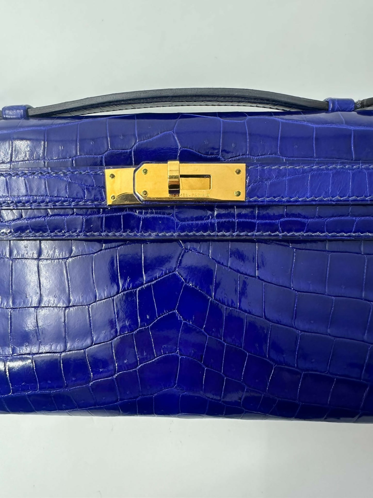 Hermès Kelly Cut 7T Bleu Électrique Crocodile Niloticus Lisse gold hardware