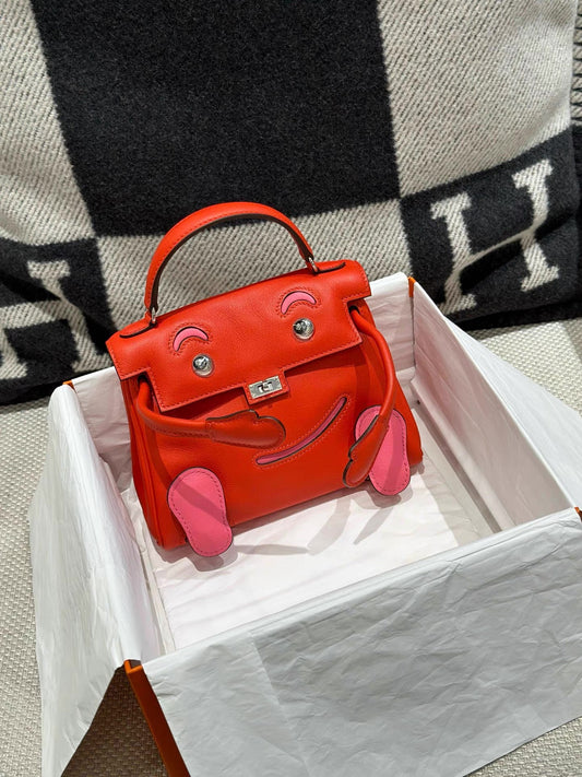 Hermes Kelly Doll capucine & rose azalée Swift leather with palladium hardware