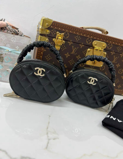 Chanel CC Ruched Oval Top Handle Quilted Lambskin Mini