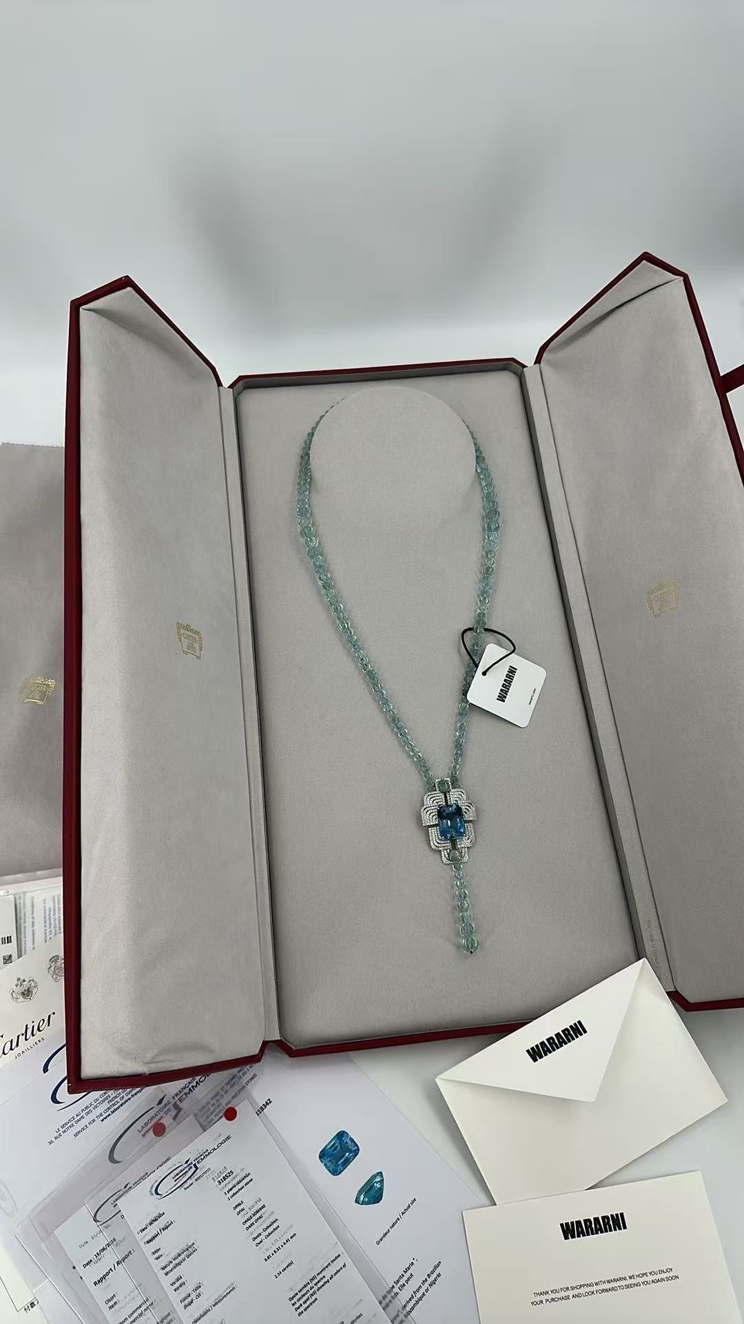 Cartier High Jewelry Necklace - Main stone: 37-carat aquamarine; two opals; chain beads: topaz.
