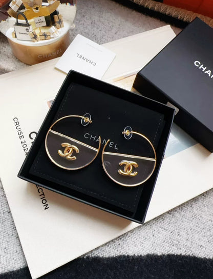 Chanel 23S gold double C transparent acrylic hoop earrings