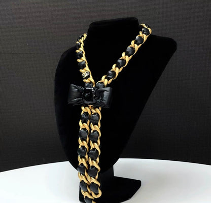 Chanel 20A tie style gold & black ribbon bow with camellia flower leather chain necklace