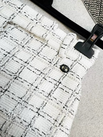 Chanel 20p black and white check wide-leg trousers