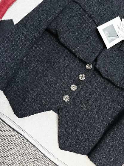 Chanel 22c black tweed jacket,