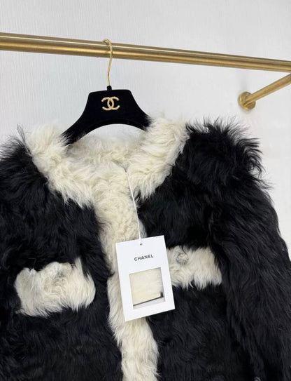 Chanel 21k black and white fur coat