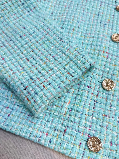 Chanel 25A light blue tweed jacket with gold lion buttons