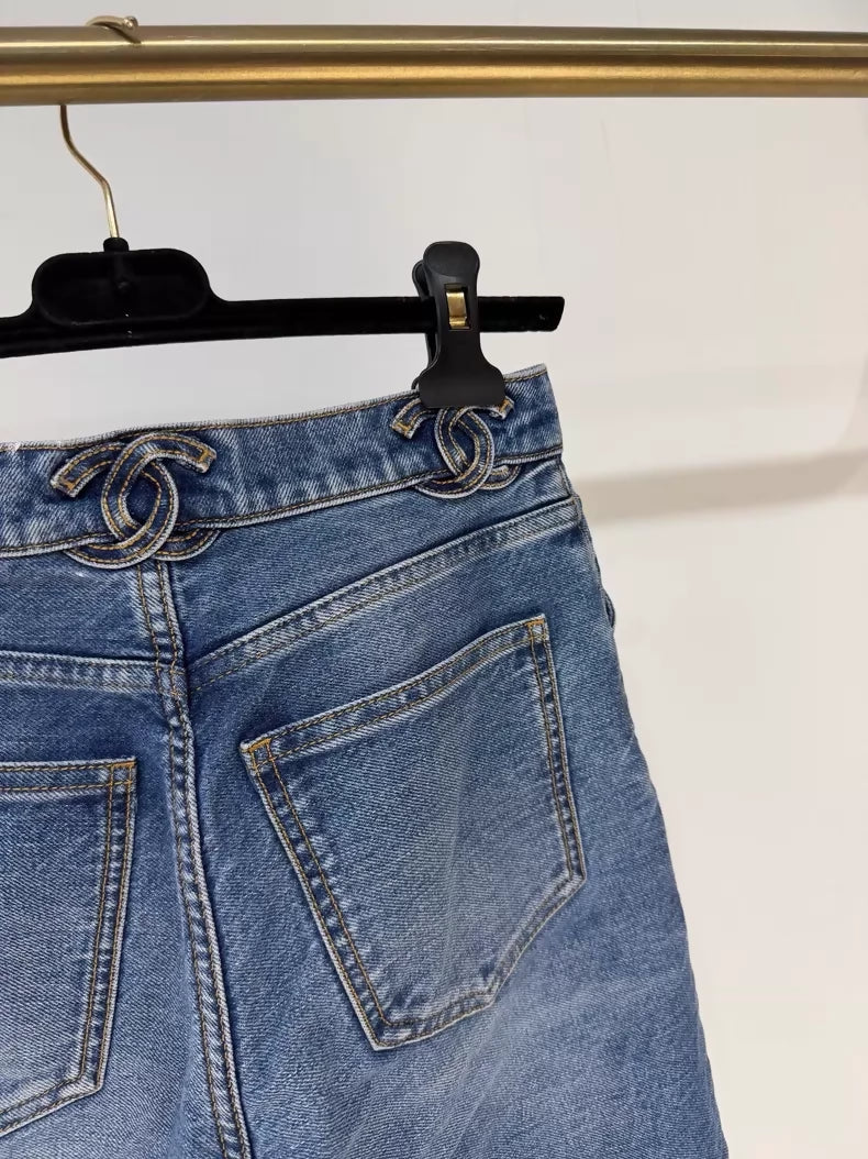 Chanel 24S jeans with the double C logo at the waist