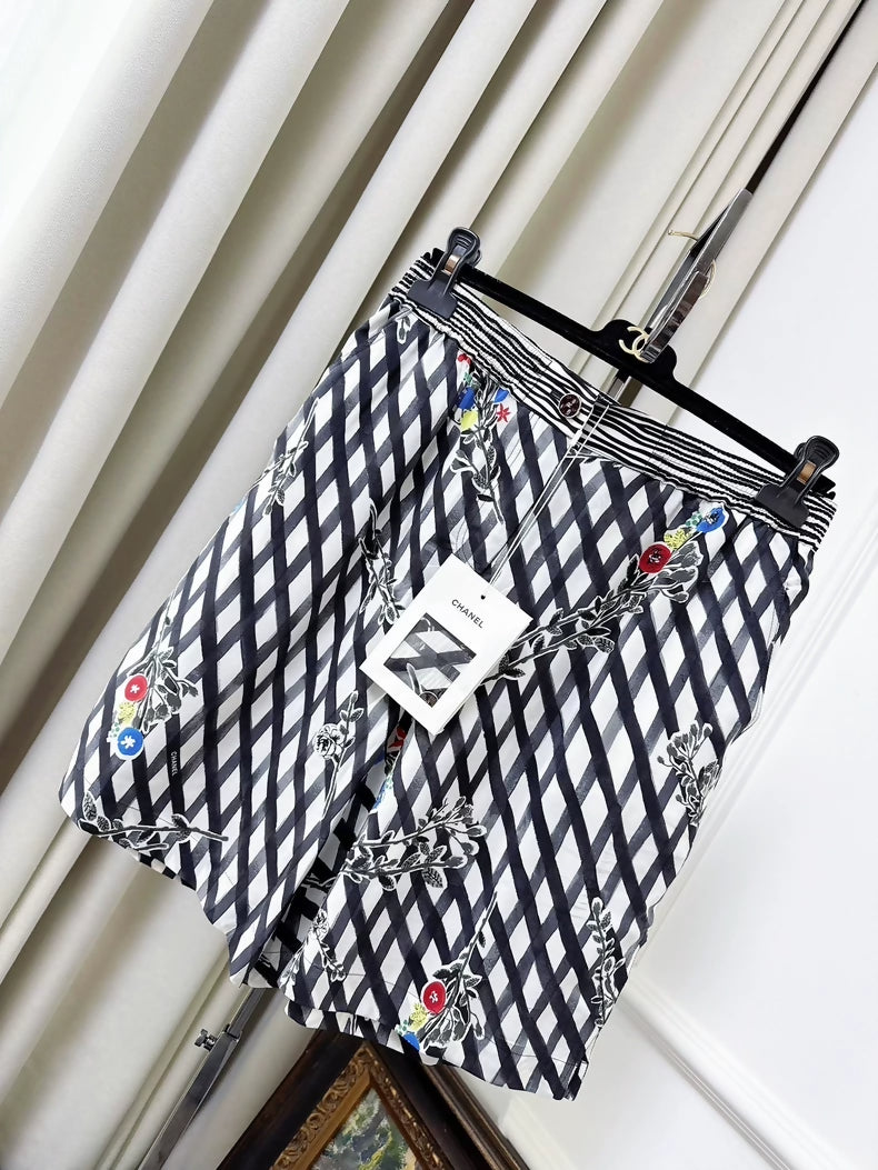 Chanel 26P black quilted silk floral shorts