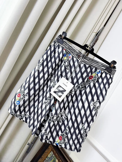Chanel 26P black quilted silk floral shorts
