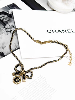 Chanel 22A  black and gold bow leather chain choker necklace