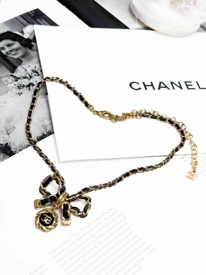 Chanel 22A  black and gold bow leather chain choker necklace
